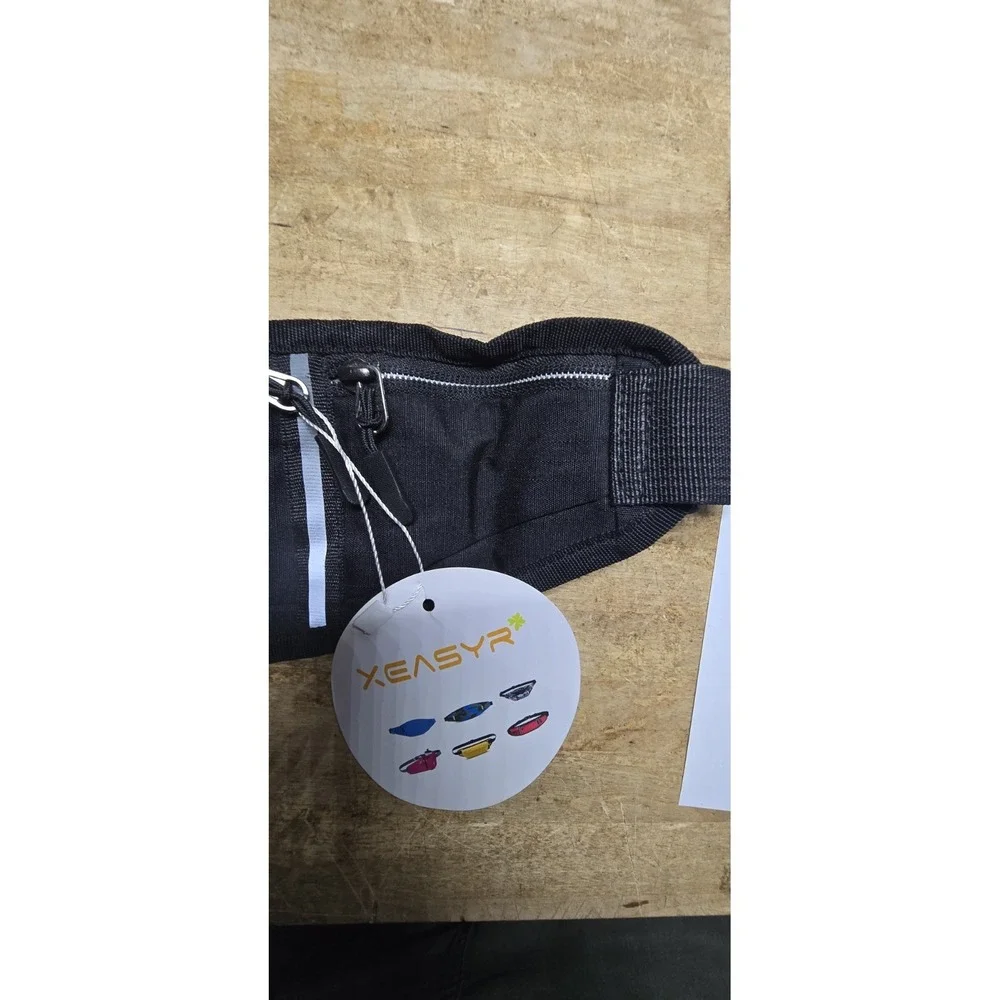 Xeasyr brand black running belt designed for carrying small essentials like phon